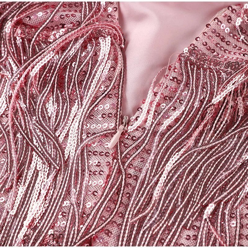 Abito da sera mini con piume